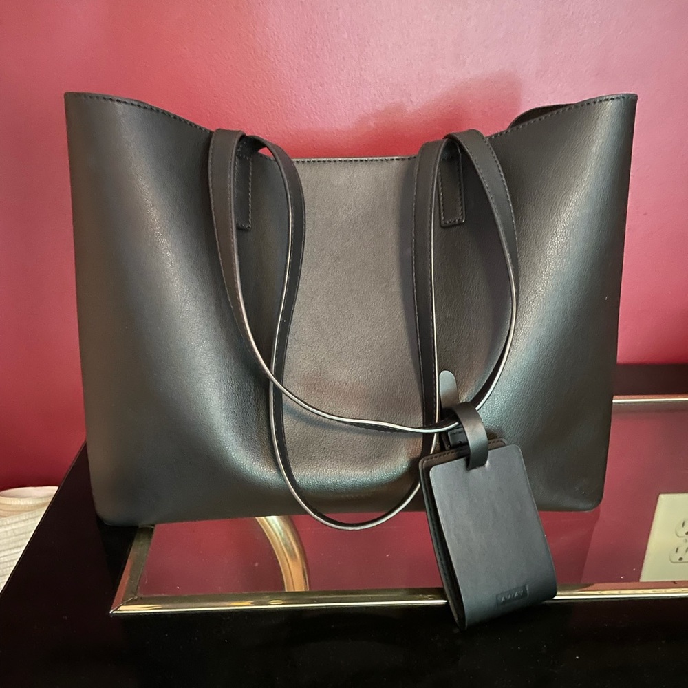 Away Latitude Tote Bag in Black with luggage tag